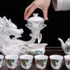 2-49.jpg Delicate White Ceramic Semi-Automatic Gongfu Tea Pot Set with Gilded Ornate Dragon Design
