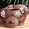 4-32.jpg Gongfu Teapot in Dragon Boat Shape with Strainer Crafted from Black and Brown Yixing Clay Chinese Design