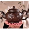4-33.jpg The Spirit of the Dragon and Horse Brown Yixing Clay Teapot with Dragon Spout Strainer
