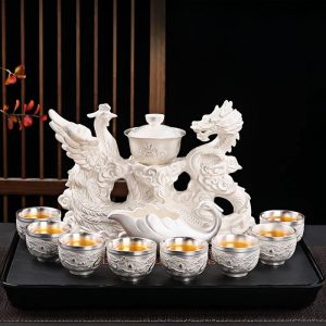 a-43.jpg Majestic Chinese Handmade Ceramic Gongfu Tea Cup Set with Silver Dragon Phoenix Lazy Semi-Automatic Design