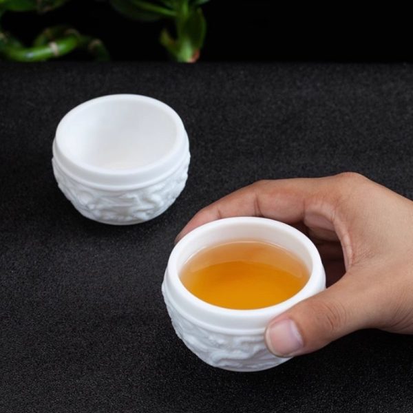 c-9.jpg Handmade Embossed Flying Dragon White Jade Porcelain Kung Fu Tea Cup