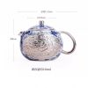 e-26.jpg Vintage Ceramic Teapot With Blue And White Relief Pattern Featuring Silver Dragon And Phoenix